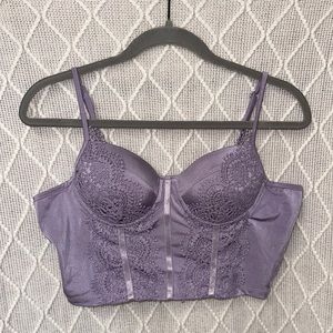 This purple corset top is the perfect going out top. Worn twice, great condition